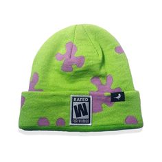 Keep your head warm with our Wumbo Beanie! Featuring a comfortable and cozy design, this beanie also boasts a unique green and purple flower print. Keep your head warm while letting the world know that wumbo is not only a word but in fact also a rating. Features Cuffed Knit Embroidered woven label on front 100% durable acrylic construction Purple Beanie, Cozy Design, December 1st, Woven Label, Purple Flower, A Word, Blue Jacket, Knit Beanie, Your Head