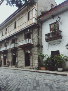 an old brick building with balconies and balconys