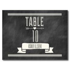 a chalkboard sign with the words table 10 and an arrow on it