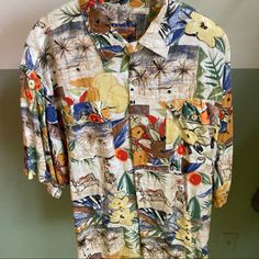 Vintage Tropical Print Shirt- Like New. This Was My Gift In A White Elephant Gift Exchange And I Have Never Worn It. I’m A Medium To Large And Although There Is No Apparent Size Tag, It’s At Least An Xl And Probably More Like An Xxl. I Will Be Glad To Send Measurements If Needed. Rayon/Linen Blend Casual Multicolor Cotton Hawaiian Shirt, Casual Patterned Shirt With Tropical Print, Casual Tropical Print Shirt, Hawaiian Collared Top With Graphic Print, Hawaiian Collared Tops With Graphic Print, Casual Multicolor Cotton Camp Shirt, Casual Multicolor Shirt With Tropical Print, Hawaiian Long Sleeve Tops With Tropical Print, Long Sleeve Hawaiian Top With Tropical Print