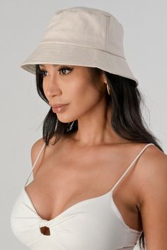 Stay stylish this summer with this stylish bucket hat, available in 16 vibrant colors. This trendy hat is the perfect addition to any outfit. Stay cool and protected from the sun while looking fashionable. DETAILS Short brim solid canvas cotton bucket hat One size fits most CONTENT, SIZING & CARE Measurements : 2.5"(L) - 58cm Head Circumference Fabric Contents: Cotton Blend Made In: China Cotton Bucket Hat, Trendy Hat, Statement Tees, Pink Turquoise, Hats For Sale, Summer Ready, Head Circumference, Stay Cool