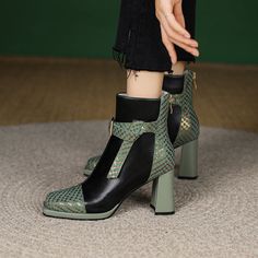 Step into something sassy with these green ankle boots! They're made with genuine leather and a strap with snake embossing. giving them a touch of wild style. The heel is the perfect height for all-day wear. and the pointed toe gives you a lengthened look. Whether you're headed to the office or out on the town. these versatile boots will take your style up a notch. Upper: Lambskin Lining: Leather Outsole: TPR Toe: Square Toe Closure: Zip Heel:  7.5cm/3'' Color: Green made: Yes Green High Ankle Heels For Fall, Green Ankle Boot Heels For Winter, Chic High Ankle Green Boots, Green High Heel Faux Leather Boots, Green High Heel Boots For Fall, Chic Green Ankle Heeled Boots, Green Faux Leather Ankle-high Boots, Trendy Leather Heeled Boots With Ankle Strap, Trendy Leather Ankle Strap Heeled Boots