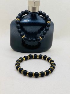 This men or unisex double stack set is a nice touch to your After 5 or formal dress attire. The black matted beads with the gold tone trim with a diamond effect accent make it a class act. Hot Springs California, Desert Hot Springs, Stack Bracelet, Dress Attire, Bracelets Diy, Beaded Bracelets Diy, A Class, Bracelet Stack, Hot Springs