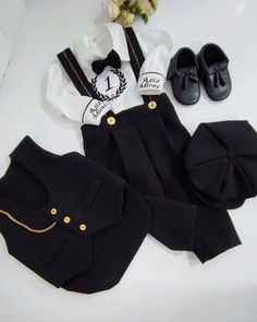 NOTE Please visit my shop for many other kids costumes and custom made outfits.. https://www.etsy.com/shop/SammysCostumes/?etsrc=sdt This Baby Boys Black Ring Boy 5 Pieces Tuxedo Suit is custom made to order. It comes with Short or Long Pants Boys Shirt, Suspenders, Boys Bow tie, Vest and Free embroidery on arms/cuffs. You can also choose to have date embroidered on one cuff, and name on the other.   Order for 3 6 9 12 months photoshoot with customization for specific month  Order for 1 2 3 4 5 6 7 8 year old birthday photoshoot with customization request for specific age  FREE SHIPPING and FREE EMBROIDERY   Matching shoes can be purchased for Age 1 and Age 2 Separately    Newspaper Boys Hat Can be Purchased Separately  NOTE You can order with SHORT or LONG Pants NOTE You can order differe Fitted Black Sets For Birthday, Black Fitted Sets For Birthday, Ring Bearer Tuxedo Black, Ring Bearer Tuxedo, Black Ring Bearer, Formal Black Suit, Baba Suit For Kids Boy, Baby Boy Suit Formal, Months Photoshoot