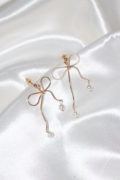 gold bow stud earrings pearl dangling fashion accessory jewelry stainless steel hypoallergenic water resistant tarnish free Bow Jewelry, Bow Earrings, Diy Bow, Wire Earrings, Jewelry Diy, Statement Earrings, Jewelry Box, My Style, Quick Saves