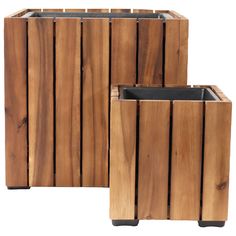 two wooden planters sitting next to each other