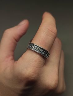 925 k solid sterling silver engraved nordic runes adjustable band ring for men and women. Everday use 24 runes statement ring. Great couples gift and friendship ring gift. Grooms men ring. SIZING This ring is adjustable and suitable for men's and women's use . You can write us your size for the perfect fit. Ring size set up for 11 1/2 US ( 26 EU ) and it can be adjusted 2 sizes up and down. PACKAGING Comes with jewelry box , ready to gift. Custom gift message is available. PRODUCTION All our jew Silver Ring For Men, Nordic Runes, Friendship Rings, Viking Style, Ring For Men, Gift For Boyfriend, Statement Ring, Band Ring, Couple Gifts