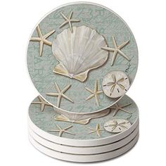 seashell coasters with starfish and shells on the bottom, set of 4