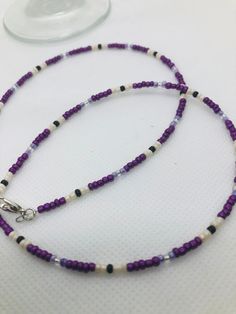 "This beadwork project is a design that is made on Accuflex beading wire. It measures 20\". It is not stretchy.  If you would like this necklace done in a different size or colors, let me know and I'll set up a listing for that.  You are purchasing this actual beaded necklace. Let me personalize some especially for you in your school colors. This is the colors of our local high school Caverna High School." Purple And White Beaded Necklace, Purple Seed Beads Necklace, Beaded Necklace Purple, Cave City, Bumble Bee Print, Necklace Purple, Bee Print, Beading Wire, Stretchy Bracelets