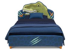 a bed with a dinosaur headboard and blue sheets