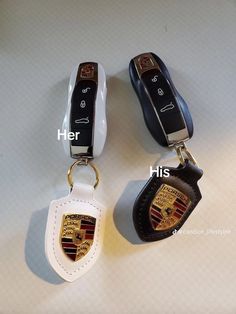 three different types of car key chains on a white surface with the words her and him written below them