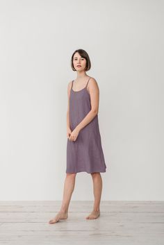 ADELA cami dress in lavender color. * Straight cut * Adjustable straps * Without pockets DETAILS: * 100% linen ( pre-washed, medium weight). * This item is made from pre-washed medium weight linen, which means that it is soft and comfortable from the first wear. It has been certified by STANDARD 100 by OEKO-TEX and European Flax, ensuring that it is free from harmful substances and produced using environmentally friendly practices. This linen item is a high-quality choice for those who value sus Purple Dress With Adjustable Spaghetti Straps, Summer Dress With Straight Neckline In Purple, Summer Dresses With Straight Neckline In Purple, Summer Knee-length Sleep Dress, Purple Summer Dress With Straight Neckline, Purple Summer Dresses With Straps, Purple Summer Dress With Straps, Summer Purple Dress With Straps, Lavender Spaghetti Strap Dress