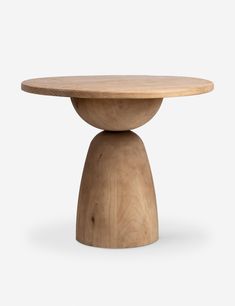 a round wooden table with two legs and a circular top, on a white background