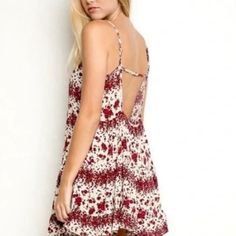 Beautiful Fitting Dress By Brandy Melville One-Size Never Worn Can Ship Out Same Day. Casual Sleeveless Mini Dress With Rose Print, Casual Red Floral Dress For Day Out, Summer V-neck Mini Dress With Rose Print, Summer Mini Dress With Rose Print, Summer White Floral Dress With Rose Print, White Summer Floral Dress With Rose Print, Red Sleeveless Summer Floral Dress, V-neck Summer Mini Dress With Rose Print, Red Rose Print Dress For Spring