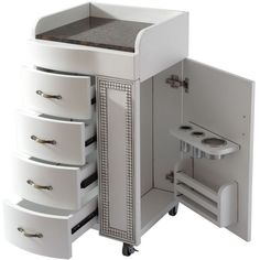 a white cabinet with drawers and shelves on wheels