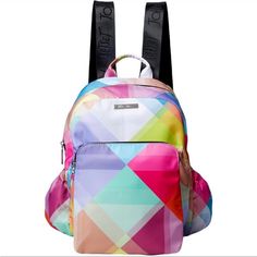 Betsey Johnson Geometric Nylon Backpack Purse Nwt * Offering A Spacious Interior And A Zip-Closure Cosmetic Bag To Hold Small-Size Accessories. Includes Pink And Blue Geometric Backpack And Matching Cosmetic Bag (Two Pieces Total) Backpack: 10.5'' W X 13.5'' H X 4.25'' D 3'' Handle Drop 19'' Strap Drop Outer: Nylon Lining: Polyester Zip Closure Interior (Backpack): One Zip And Two Slip Pockets Exterior (Backpack): Two Side Slip Pockets Imported Multicolor Nylon Bags For School, Multicolor Nylon School Bags, Trendy Multicolor Softback Backpack, Trendy Pink Nylon Backpack, Multicolor Nylon Bag With Adjustable Strap, Multicolor Nylon Backpack For On-the-go, Trendy Multicolor Backpack For Daily Use, Trendy Multicolor Backpack For On-the-go, Convertible Backpack Purse