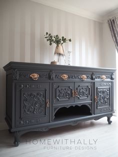 an ornately decorated sideboard in a living room