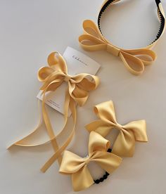 School Satin Bows School Girl Hair Bow  ⭐️ Set of 4 hair pieces for school girls I N C L U D E D /    ✔️ 1 x Long Double Bow Headband         (Bow 16 x 2.5cm)   ✔️ 1 x Twist Tail Bow (10.5 x 6 cm ) with lead tested french barrette   ✔️ 2 x Cute Bow Hair Ties (10 x 7cm)     ⭐️ Available in 11 colours  (navy, deep green, red, maroon, black, white, grey, blue, yellow, light blue, smoky blue) ⭐️ Each bow will appear slightly different depending on the cut of fabric. ⭐️ All products are carefully handmade with love and great attention to detail in Australia. ✔️Note  As this is a handmade product, slight variations in pattern placement and colour may be present. Thank you for visiting and shopping at ribbonie. School Hair Accessories, Bow Hairstyles, Estilo Blair Waldorf, Smoky Blue, School Hair, Hair Bow Sets, Bow Hairstyle