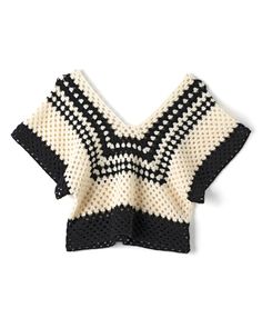 a black and white knitted sweater with an open v - neck, on a white background