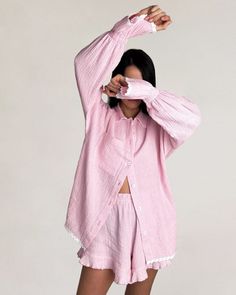 Wrap yourself in comfort and elegance with our Cotton Cardigan Sleepwear Luxurious Pajama Set. This two-piece ensemble exudes sophistication with its delicate lace trim and cozy cotton fabric. The open-front cardigan adds a touch of versatility, allowing you to layer up for extra warmth or wear it open for a relaxed look. The long-sleeve pajama provides ample coverage, while the short pants offer breathable comfort, making it perfect for lounging or a restful night's sleep. Elevate your bedtime routine with this luxurious pajama set designed for ultimate relaxation and style.Key Features:Premium Cotton Fabric: Crafted from pure cotton, this pajama set for women offers exceptional softness and breathability, ensuring a comfortable and skin-friendly feel all night long.Elegant Lace Trim: Del Pink Two Piece Set, Linen Nightgown, Lace Lanterns, Shorts Sleepwear, Pink Two Piece, Baggy Shorts, Africa Fashion, Sleepwear Sets, Cotton Cardigan