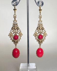 "Very dramatic pair of  Art Deco statement earrings in Ornate Bohemian  style  Lovely Antique gold Filigree panel set with red glass stones and bee motif   Finished with vintage red glass stones cabochon drops to the bottom Earrings look very dramatic on & will generate lots of comments  Earrings have lever back wires gold plated  for pierced ears, lead & nickel free In excellent condition Size: just over 3 & 1/2\" (9 cm) long ,  these are quite long so please check size before buying- if big earrings are not your thing please have a look at some of my other designs." 1920s Bohemian, 1920 Style, Flapper Art, Art Deco 1920s, Cabochons Stones, Gold Filigree, Big Earrings, Red Glass, Style Boho