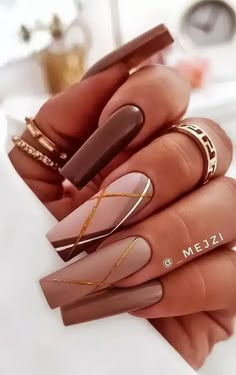 Brown and Gold fall nails set #womenfashion #fallfashion #fallnais #naildesign #fallnaitrends Classy Birthday Nails Coffin, Winter Long Nails Acrylic, Neutral Coffin Nail Ideas, Pretty Coffin Nail Designs, Novemember Nails, Fall Nail Inspo Coffin, Nail Ideas Acrylic Coffin, November Nail Art, November Nails Colors