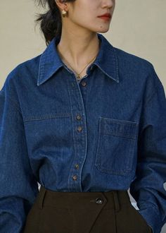 Experience the timeless elegance of our French Blue Peter Pan Collar Button Pockets Denim Shirts, perfect for the fall season.Fabric: Denim FabricSize & Fit:Fit: This garment fits true to size.Length: Size L measures 26.91"from shoulder to hemBust: Great for any cup size. Waist: Loose Fit. Comfortable room throughout midsection.Hip: Loose Fit - room for hips.Hand Wash Cold. Fitted Button Up, Tomboy Stil, Denim Shirt Outfit, Denim Shirt Style, Stylish Kurtis Design, Blue Peter, Denim Shirts, Retro Mode, Classy Work Outfits