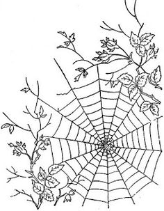 a spider web with leaves and flowers on it