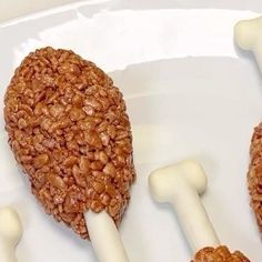 two bone shaped treats are sitting on a plate