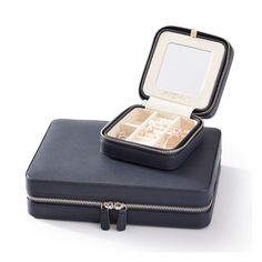 Keep your jewelry organized at home or on the go with this all-inclusive set of our bestselling Traveling Jewelry Cases. They feature linen-lined interiors packed with compartments to hold rings, earrings, bracelets and necklaces. Plus, the sleek faux leather exterior is perfect for monogramming for an extra a pop of personalized color.    Includes one small and one large Travel Jewelry Case.  Small: 4.5"w x 4.5 d x 2.25"h  Large: 9.75"l x 7.25"w x 2.25"h  Pebbled vegan leather with a soft linen Travel Tech Organizer, Jewelry Cases, Organization Gifts, Gift Business, Mark And Graham, Gifts For Colleagues, Bracelets And Necklaces, Travel Jewelry Case, Bar Glassware