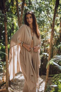 Handcrafted from 100% Mexican cotton, this unisex poncho combines comfort with style. Featuring a hood and arm openings, it’s perfect for any beach occasion. Available in ONESIZE and four classic colors: White, Arena, and Black. Made for heights 1.65–1.95 cm Hooded Cotton Poncho For Summer, Oversized Summer Poncho For Loungewear, Summer Oversized Poncho For Loungewear, Long Sleeve Cotton Beach Poncho, Cotton Summer Poncho For Loungewear, Oversized Hooded Poncho For The Beach, Beige Beach Poncho, Beige Oversized Poncho For The Beach, Oversized Beige Poncho For The Beach