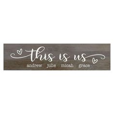 this is us wood sign with hearts and the words,'this is us '