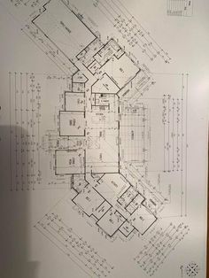 a blueprint shows the floor plan for a house with multiple floors and lots of windows