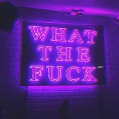 a neon sign that says, what the fock?