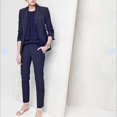 Never Worn Summer Workwear Suits With Pockets, Fitted Pantsuit With Welt Pockets For Spring, Summer Business Casual Pantsuit With Notch Lapel, Fitted Tapered Leg Pantsuit For Spring, Fitted Spring Pantsuit With Tapered Leg, Chic Spring Suits For Career, Chic Spring Career Suits, Tailored Tapered Leg Suits For Spring, Tailored Tapered Leg Spring Suits