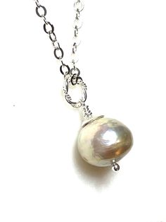 Gorgeous large 11 x 14mm freshwater cultured Kasumi pearl wire wrapped on sparkling sterling silver cable chain.  Beautiful Chinese Kasumi Baroque pearl with characteristic iridescent bumpy surface is off white creamy color and highly lustrous. Stunning single pearl displays a gorgeous array of metallic colors in the light. You will receive this exact Pearl.  Pearl is wire wrapped in .925 sterling silver with Karen Hill Tribe .999 silver cap and hangs from sparkling flat cable chain with spring Sparkle Flats, Grandmothers Love, Jewelry Chest, Silver Caps, Metallic Colors, June Birth Stone, Gorgeous Earrings, Baroque Pearls, Cable Chain