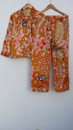 "Designed and customized in our India store, the love and care we put into every PJ will stand out to you at the moment you see it. Full sleeve shirt with buttons and loose fit trousers. Completely handmade in Jaipur from 100% pure cotton fabric. Comes in S/M/L/XL sizes, but without any complications can be adjusted to individual measurements. Note: The color and brightness of actual product may vary due to digital photography and photo editing. We crossed check each and every product before listing. available sizes and measurements (in Inches) S (EU: 36 - 38, US: 8 - 10) Pajama Top: chest girth = 40\"  waist girth = 40\" sleeve length = 21\" arm hole = 17\" shirt length = 23\" Pajama Pants: waist girth ( Elastic ) = 28-34\" inseam = 26\" thigh = 25\" pant length = 38\" M (EU: 38 - 40, US: Womens Pj Sets, Loose Fit Trousers, Full Sleeve Shirt, Bridesmaid Pajama Set, Shirt With Buttons, Pyjamas Set, Cotton Pjs, Bridesmaid Pyjamas, Monkey Print