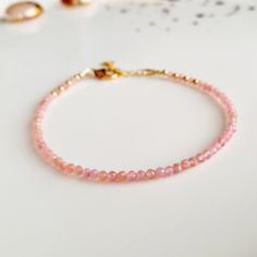 "Minimalist, wearable and delicate 14k gold filled and rhodochrosite beads bracelet. Length: from 5,5\" to 8\" with 1\" 14k gold filled extensor chain. Width: 2mm faceted rhodochrosite beads and 14k gold filled beads. Material: 14k gold filled strong lobster clasp. Handmade in Spain. ✩ Please kindly note that these stones are natural so they can vary slightly in color from the one on the pics. They can also contain some inclusions. ✩ Ideal for a gift and for combinate with other bracelets. All o Bracelet Heart, Gold Armband, Crystal Healing Bracelets, Simple Bracelets, Rose Jewelry, Chakra Bracelet, Moonstone Jewelry, Bracelet Collection, Cord Bracelets