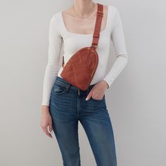 The best way to be is handsfree. Wear Fern Sling as a crossbody or sling it over your shoulder for two looks in one. Fern Sling In Pebbled Leather  Rust BELT BAGSLING in Rust | Hobo® Kendra Scott Bracelet, Rust Belt, Designer Diaper Bag, Kendra Scott Earrings, Shopping Event, Baby Gown, Kids Sunglasses, Pillow Gift, Phone Wallet