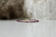 "This beautiful gemstone bracelet is made with high quality (AAA) natural Ruby crystals. Ruby is the crystal for a 40th wedding anniversary or people with a July birthday. This delicate Ruby bracelet is perfect for itself or is simple enough that it can be layered with other bracelets. This is the perfect gift for any occasion or just gift for yourself - we worth it;) . ❗️Sign up to our Newsletter and get 15% OFF your order (copy this link to browser search) - https://forms.gle/R74xLdL1MSmC9Apn6 Gift Ruby Gemstone Beaded Bracelets, Ruby Beaded Bracelets With Gemstone Beads As Gift, Ruby Beaded Bracelets With Round Beads As Gift, Ruby Beaded Bracelets With Round Beads For Gift, Ruby Beaded Bracelets As A Gift, Adjustable Ruby Bracelets Gift, Faceted Round Beads Jewelry For Anniversary, Faceted Rondelle Beaded Bracelets As Gift, Adjustable Gemstone Beaded Bracelets For Anniversary