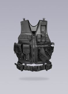 Enhance your performance during outdoor activities with this fake bulletproof armor suit. Unleash the warrior within you with our Bulletproof Military Vest, a testament to the modern urban male's fierce strength and unyielding resilience. This sartorial marvel is not just a piece of clothing; it is an embodiment of power and control, a tribute to those who dare to navigate the urban landscape with audacity and finesse. Crafted with a keen eye for aesthetics and utility, this black faux bulletproof vest seamlessly transitions from a high-stakes paintball match to a demanding urban exploration. Enriched with a plethora of features and materials - velcro, straps, buckles, cargo pockets, mesh and an integrated front belt - this combat tactical vest exudes an air of unmatched functionality. It' Bulletproof Armor, Soldier Clothes, Bulletproof Clothing, Army Vest, Urban Warrior, Bulletproof Vest, Armor Suit, Apocalyptic Clothing, Military Vest