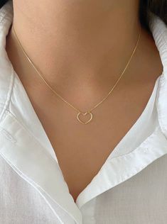 "Minimalist Dainty 14K Yellow Gold Open Heart Charm Necklace. Necklace Is Adjustable From 18\" To 16\" Inch. Perfect For Everyday Wear. Treat Yourself Or Someone Special To This Beautiful Necklace. Perfect For Layering. Chain Is A High Quality Box Chain That Feels Like Silk. Jewelry Comes In A Cute Jewelry Box Ready To Present. Model Is Wearing A 16\" Inch Chain. -All Jewelry Is New And Inspected For Quality Assurance. -jewelry Is Crafted In Genuine High Quality 14K Gold. -We Do Not Sell Gold Pl Small Chains Gold With Pendant, Elegant 14k Gold Filled Heart Necklace, Everyday 14k Gold Open Heart Charm Necklace, Delicate 14k Gold Open Heart Charm Necklace, Minimalist 14k Gold Necklace With Heart Charm, Delicate Open Heart Clavicle Chain Jewelry, Everyday 14k Rose Gold Heart Necklace, Minimalist Tarnish Resistant Heart Pendant Jewelry, Everyday Rose Gold 14k Heart Necklace