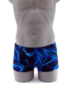 "Designed with a vibrant look sure to turn heads,this men's swimsuit lights up the beach or pool in refreshing style,this eye-catching stretch nylon square cut swimsuit for men stands out for all the right reasons. MADE IN USA PLEASE NOTE: All print fabric designs swimsuits varies, no two are alike. Drawcord waist 7\" Inch Side seams 3/4 inch waist elastic 3/8 inch leg elastic Center seam front pouch" Blue Fitted Boxer Briefs For Summer, Summer Fitted Blue Boxer Briefs, Fitted Blue Boxer Briefs For Summer, Blue Stretch Boxer Briefs For Beach Season, Fitted Swim Trunks For Summer Swimming, Blue Short Swimwear For Swimming, Blue Beachwear Swim Trunks For Diving, Blue Swim Trunks For Diving In Summer, Fitted Boxer Briefs For Surfing And Beach Season