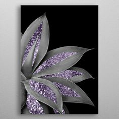 a purple and silver painting with leaves on the bottom, against a gray wall background