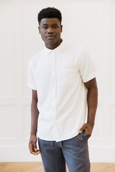 Our Short Sleeve Button Down is the perfect lived-in summer shirt. Crafted from our luxuriously lightweight blend of tencel and linen, this temperature-regulating top ensures maximum breathability and versatility throughout the year. The button-down, one-pocket design is an essential addition to your wardrobe. Pair it with our Cozy Earth Coastal Comfort Shorts or Cuffed Pants for a head-to-toe fit. Men's Cozy Earth Coastal Comfort Short Sleeve Button Down in White (Size: Large) - Cozy Earth Silk Comforter, Perfect Live, Classic Pajamas, Bamboo Pajamas, Best Pajamas, Soft Clothes, Cuffed Pants, Bamboo Fabric, Shirt Button