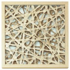 a wooden frame with an intricate pattern on it