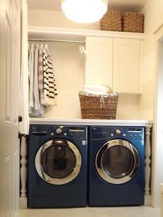 a washer and dryer in a small room