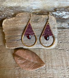 Gold filled hoop earrings with faceted garnet gemstones Handmade Hoop Earrings, Bead Frame, Gold Filled Hoops, Jewelry Techniques, Garnet Gemstone, Gold Hoop, Seed Bead Jewelry, Gold Hoop Earrings, Diy Earrings