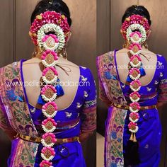 a woman wearing a blue and pink saree