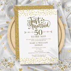 this is an image of a 50th anniversary party card with gold confetti on it